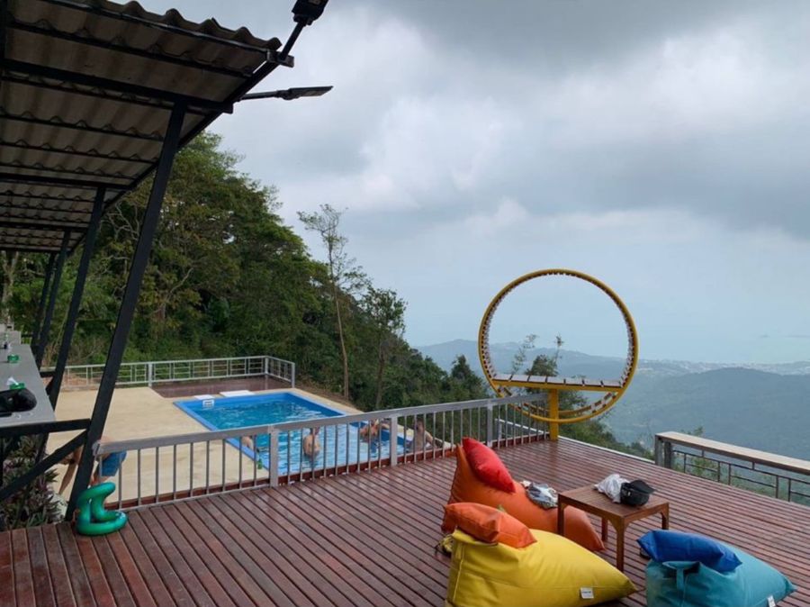 Hilltop restaurant deck with a swimming pool and a view over Koh Samui