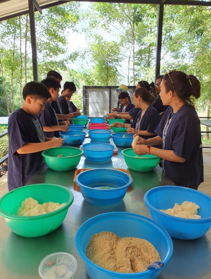 Guests preparing food for the elephants