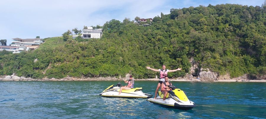 Guests on jet skis off the Samui coast