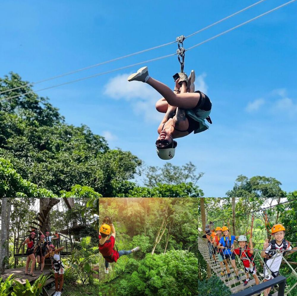 Guest hanging upside down on a zipline in Phuket, with groups on the platforms and rope bridges
